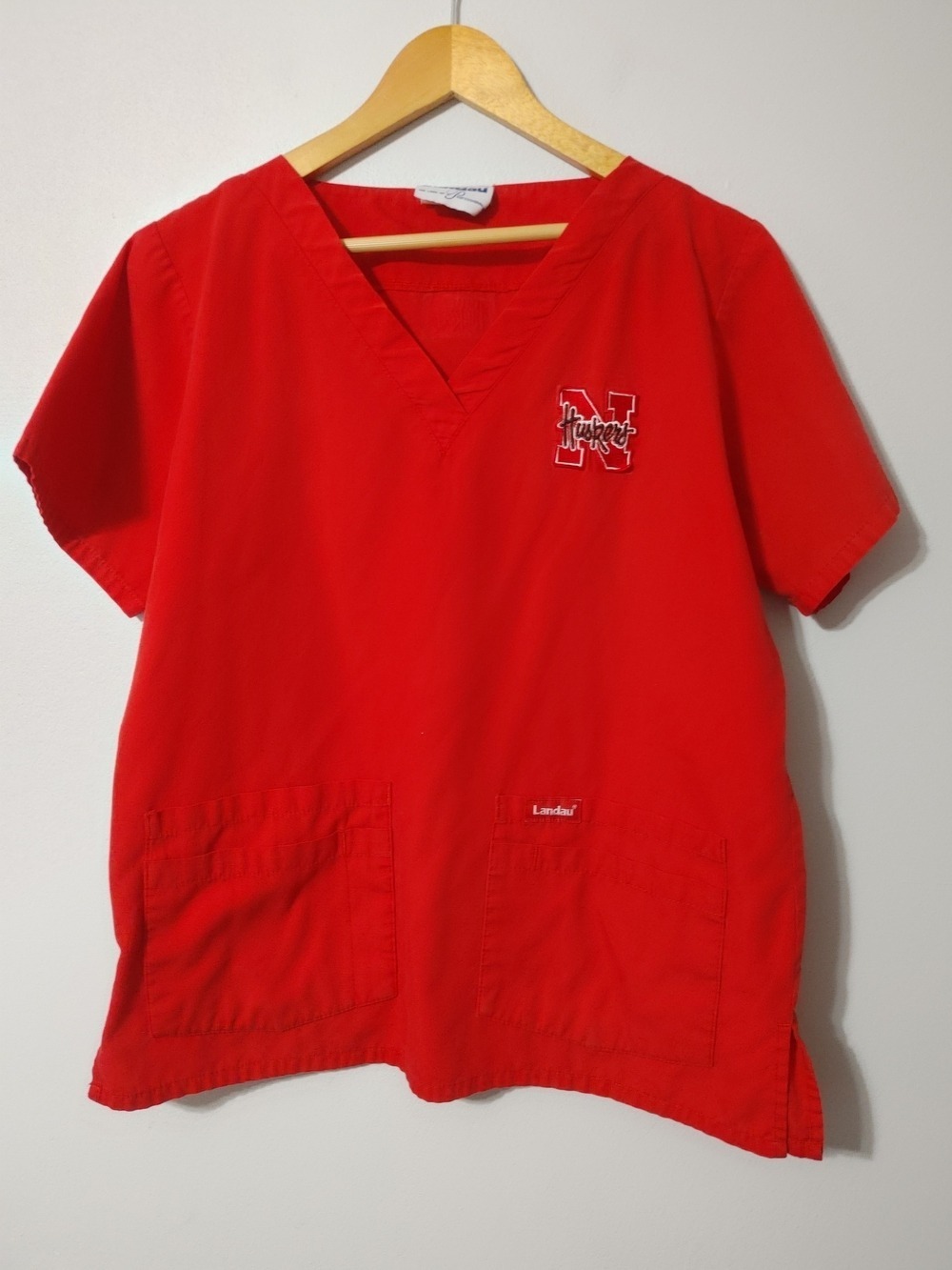 Landau Women's Crimson Red V-Neck Scrub Top - Husker Logo